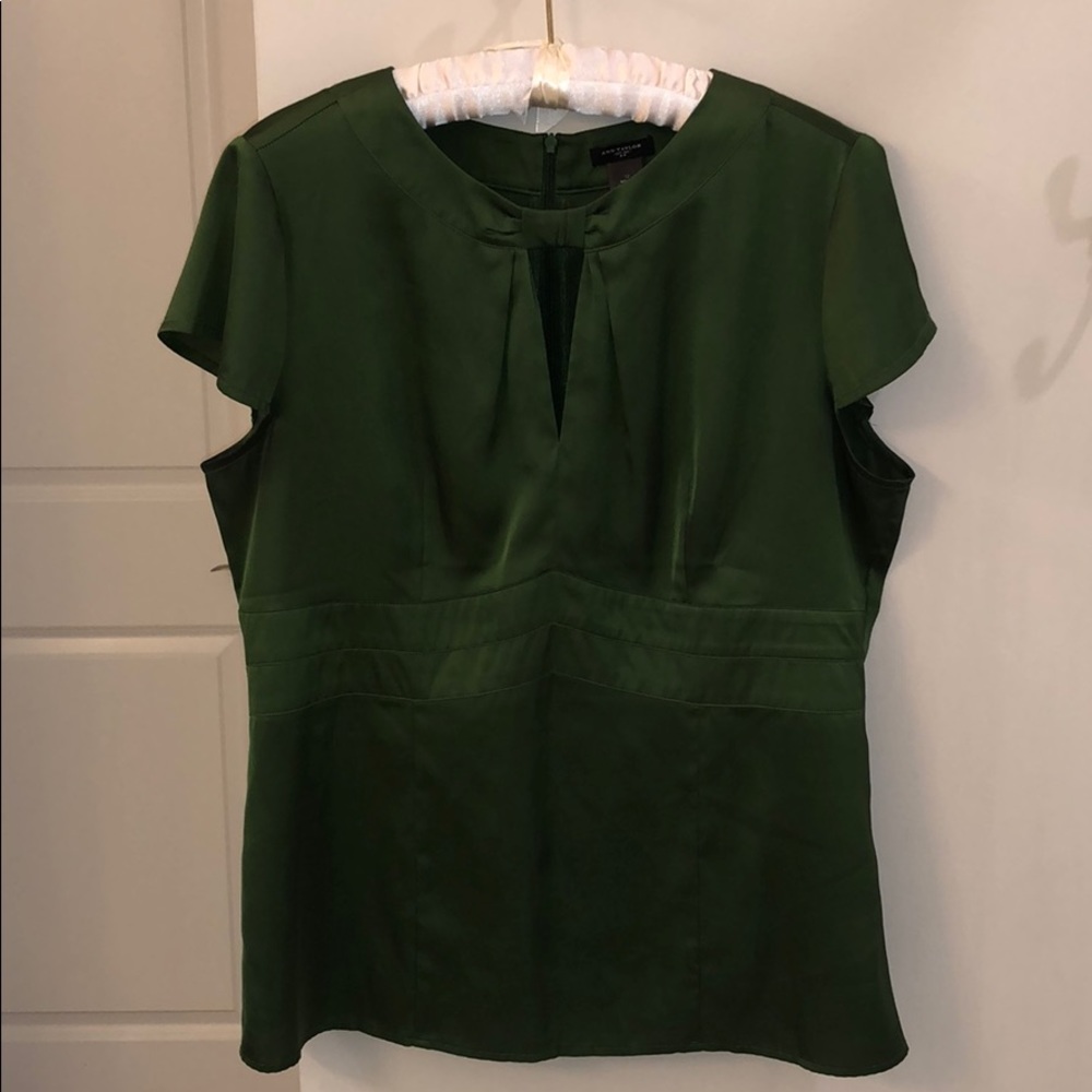 Green cap sleeve blouse.